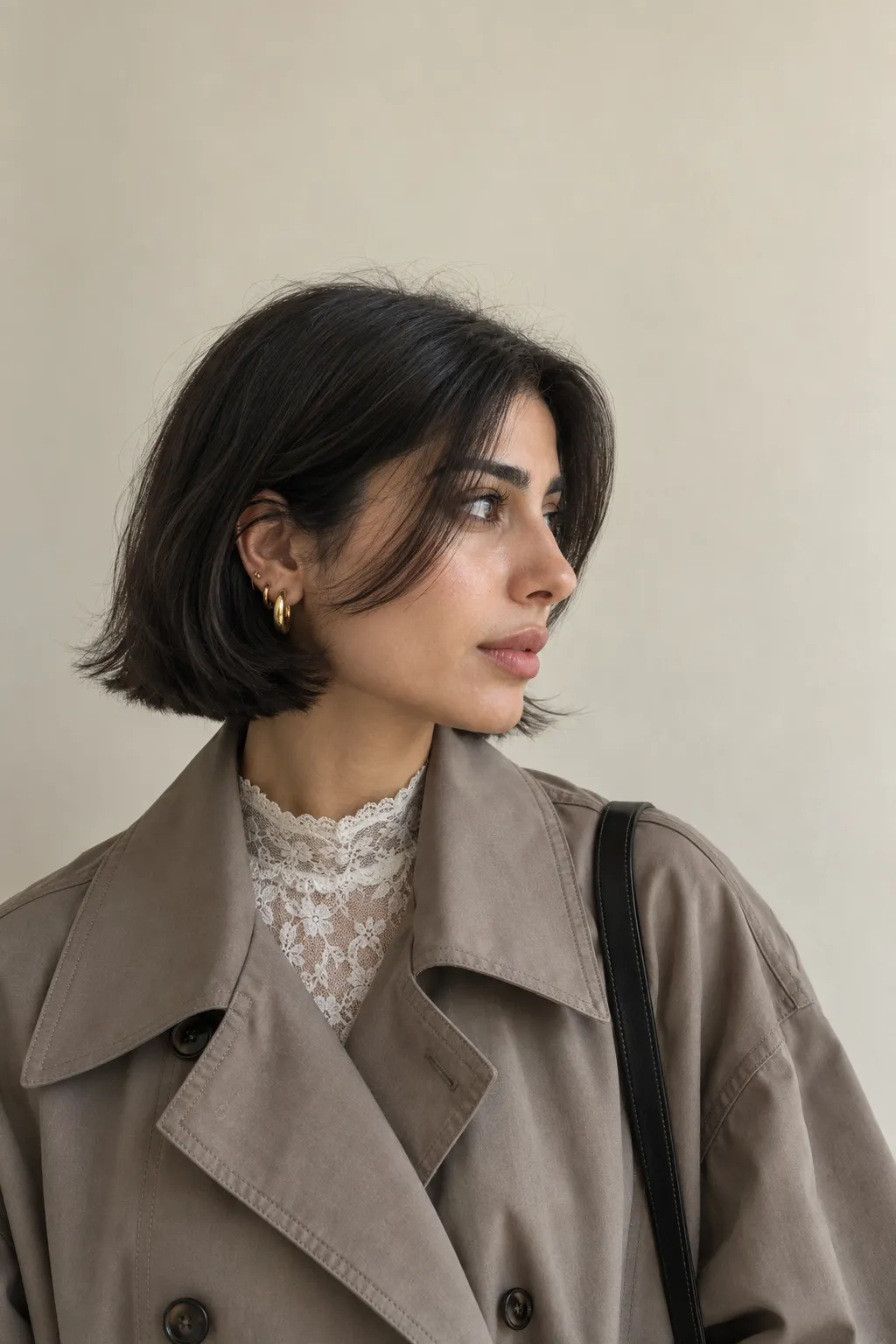 Black Italian bob with wispy curtain bangs