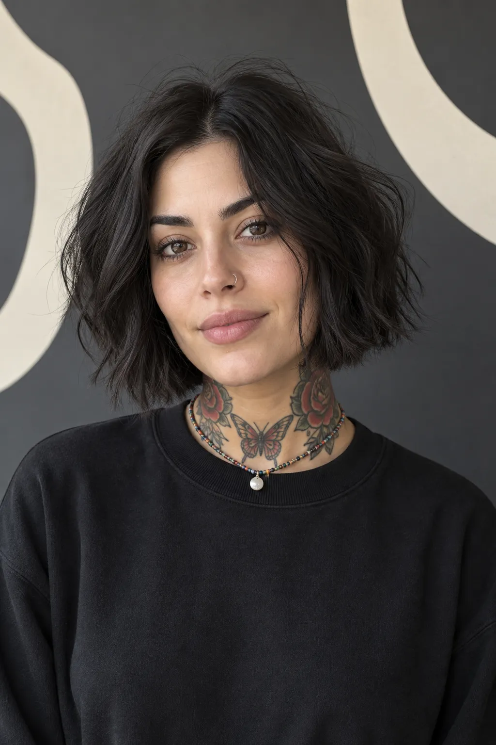 Tousled dark Italian bob with loose, natural movement