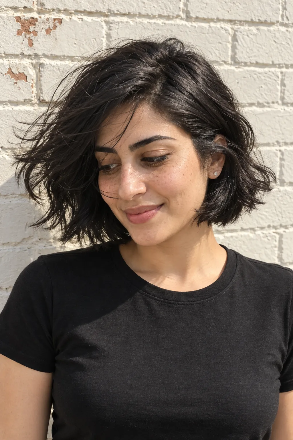 Windblown black Italian bob with breezy texture